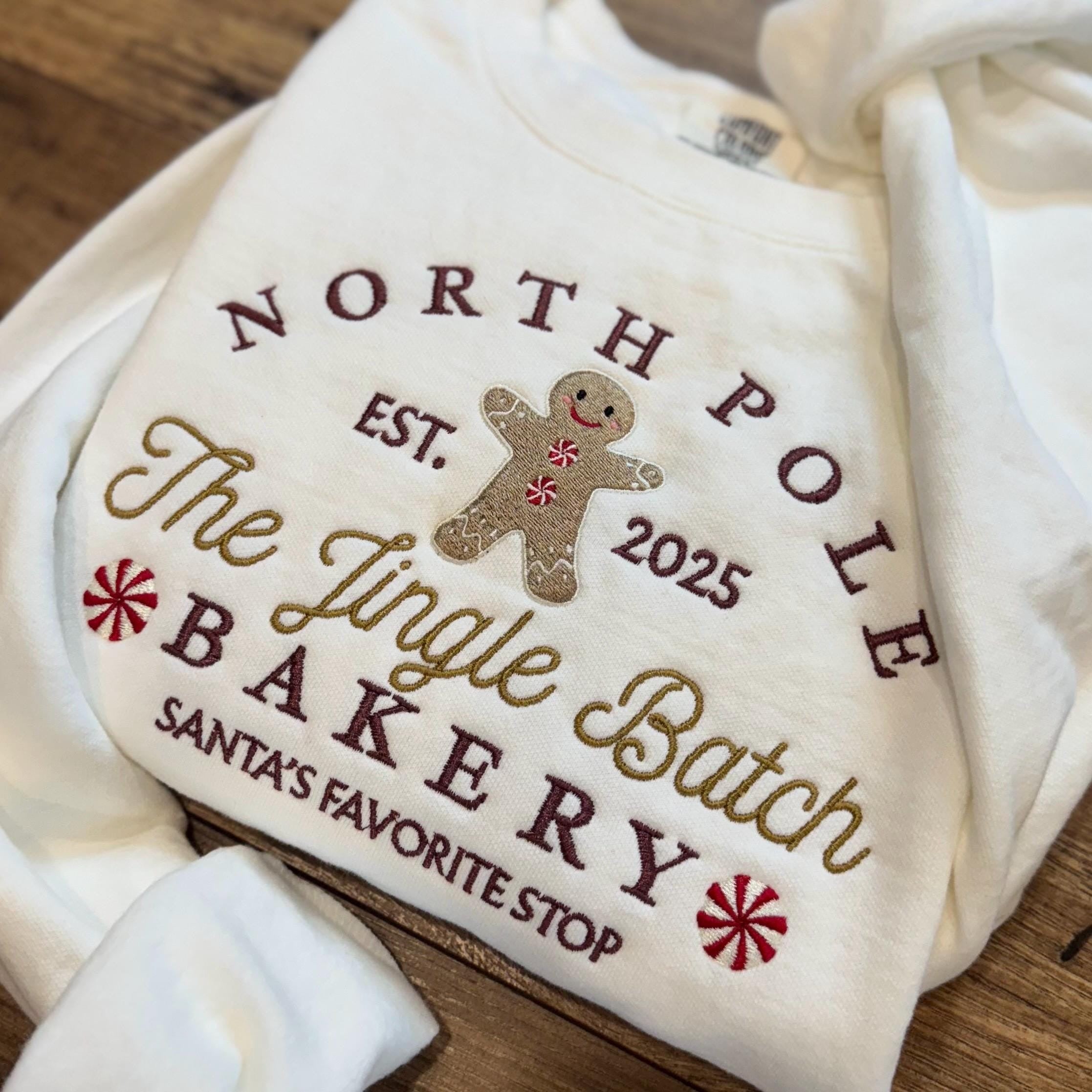 North Pole Gingerbread Bakery Embroidered Sweatshirt, Christmas Crewneck, Cozy Holiday Sweater, Cute Gingerbread Shirt Gift EBAC83